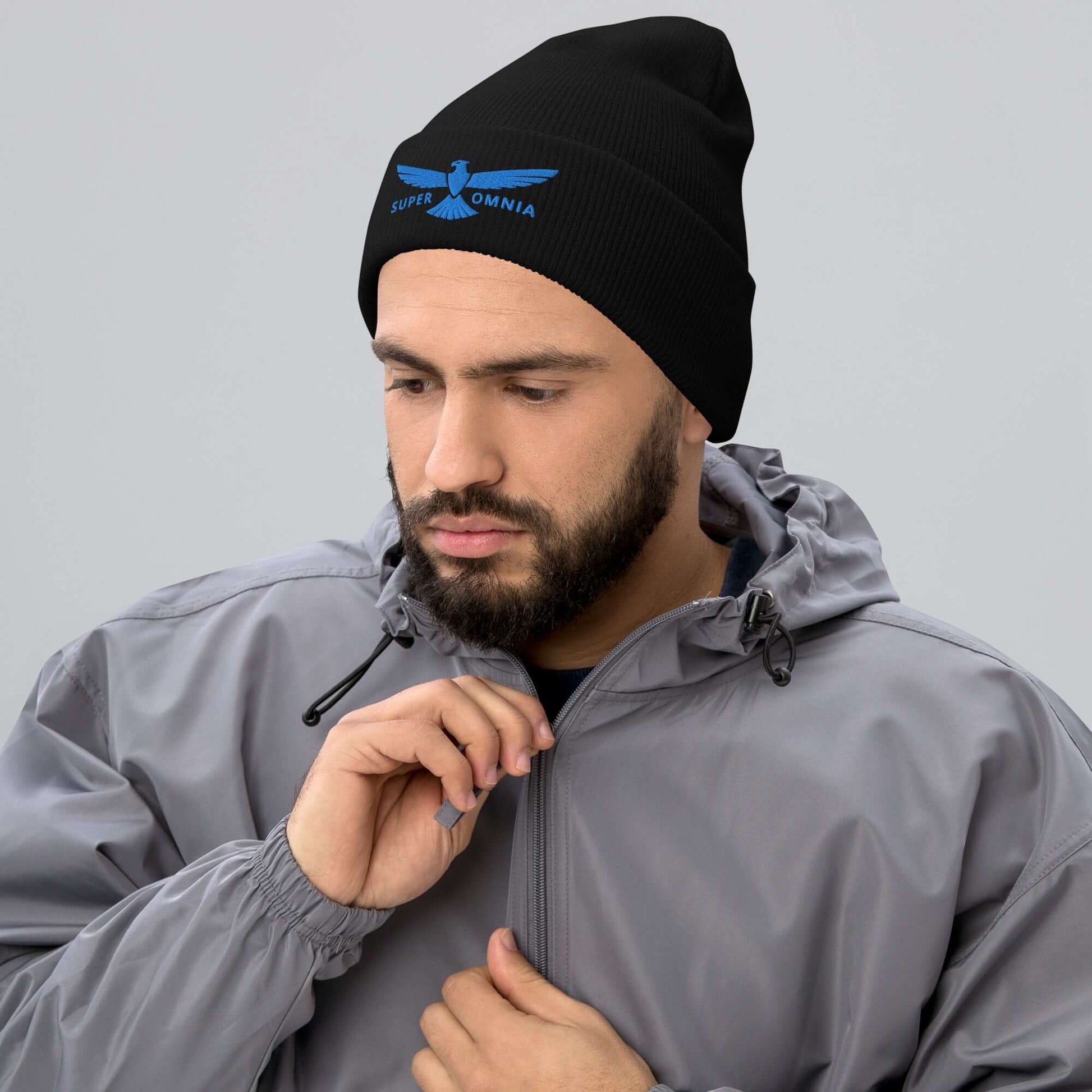 Cuffed Beanie Eagle "SUPER OMNIA" Blue One Size above all,animal motif,beanie,bold design,eagle,focus,freedom,iconic,independence,motivational,nature-inspired,resilience,soar,strength,unique design,unisex,vision,warmth,winter wear